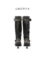 UBORYA Black Slouchy Knee-High Boots with Buckle Straps and Sculptural Heel