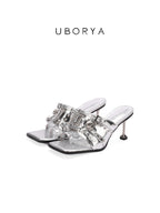 UBORYA Silver Metallic Multi-Buckle Mules with Skull Studs