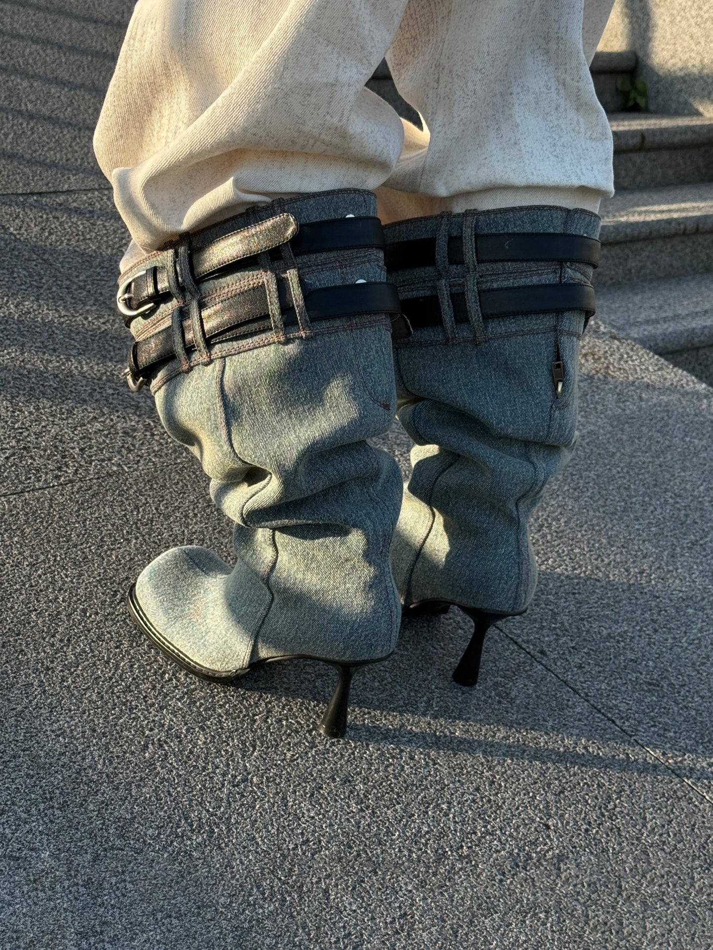 UBORYA Denim Slouchy Knee-High Boots with Black Buckle Straps – Sculptural Kitten Heel Boots for Women | Distressed Jean Booties | Avant-Garde Denim Punk Footwear