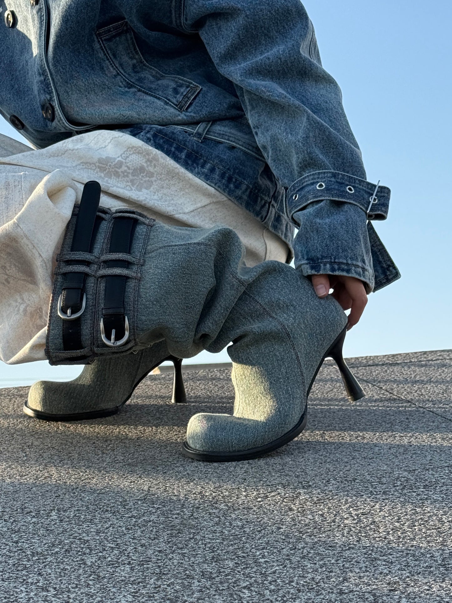 UBORYA Denim Slouchy Knee-High Boots with Black Buckle Straps – Sculptural Kitten Heel Boots for Women | Distressed Jean Booties | Avant-Garde Denim Punk Footwear