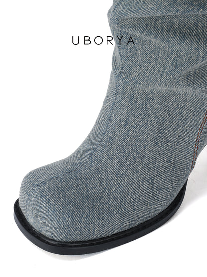 UBORYA Denim Slouchy Knee-High Boots with Black Buckle Straps – Sculptural Kitten Heel Boots for Women | Distressed Jean Booties | Avant-Garde Denim Punk Footwear