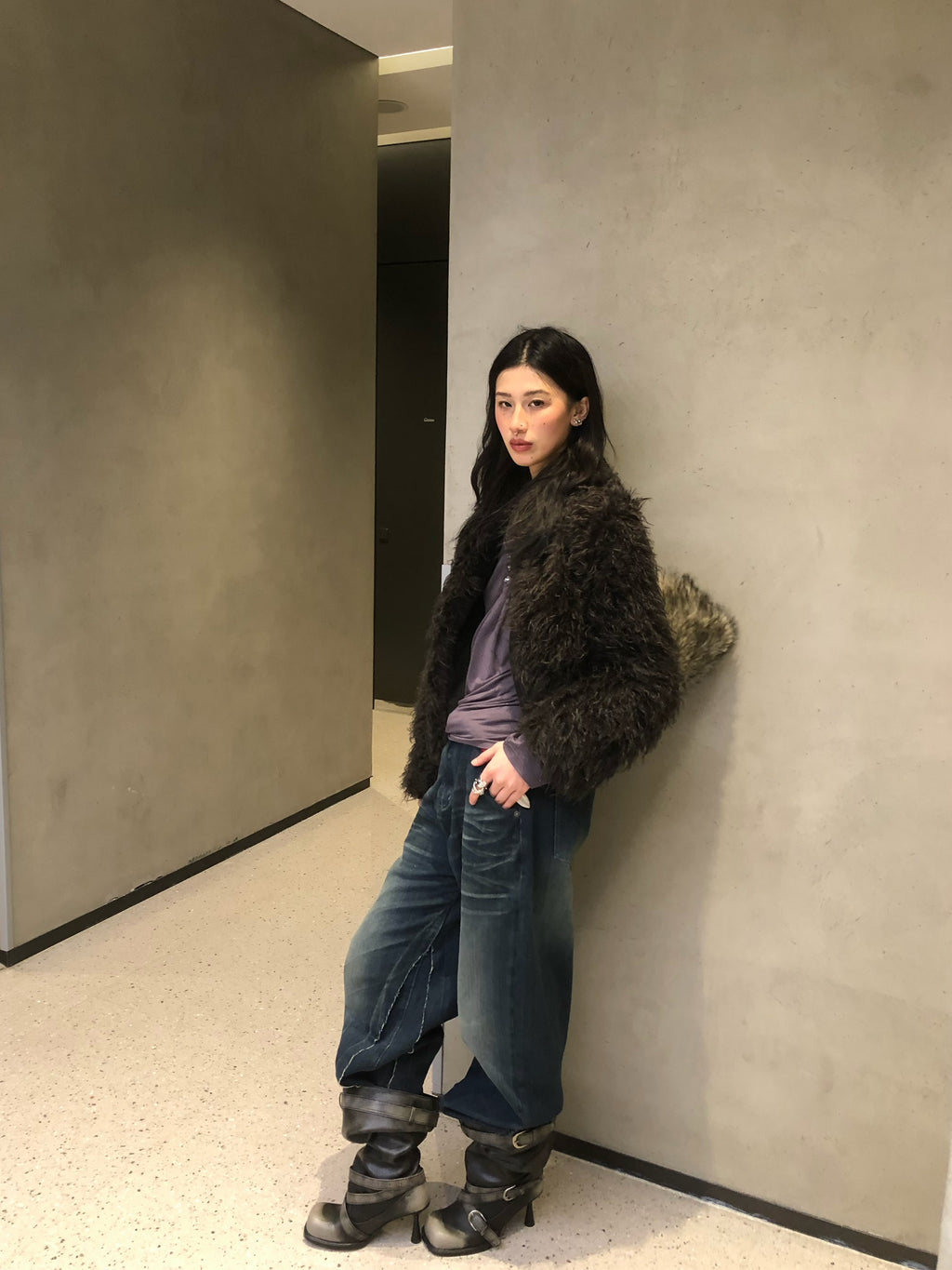 UBORYA Black Slouchy Knee-High Boots with Buckle Straps and Sculptural Heel