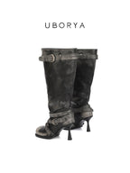 UBORYA Black Slouchy Knee-High Boots with Buckle Straps and Sculptural Heel
