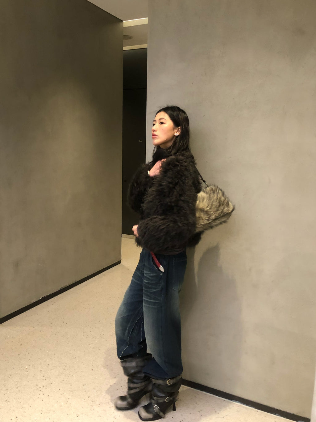 UBORYA Black Slouchy Knee-High Boots with Buckle Straps and Sculptural Heel
